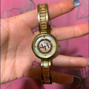 Pearl faced bezel Armani exchange gold watch